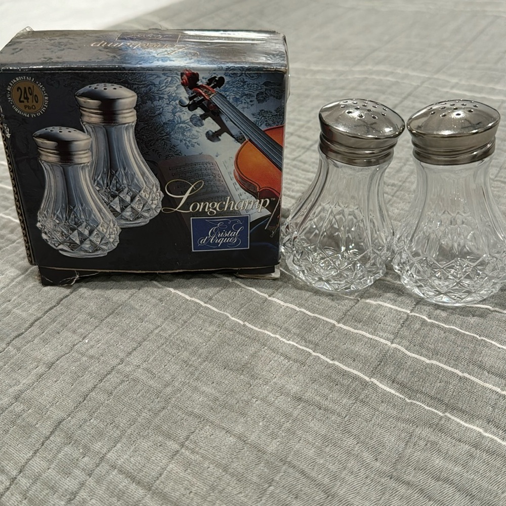 Longchamp salt and pepper crystal shakers.